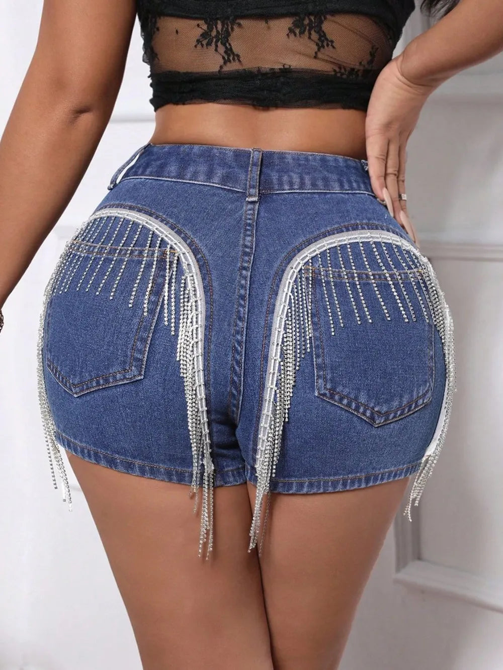 Shorts de Denim con Flecos en la Espalda y Bolsillos